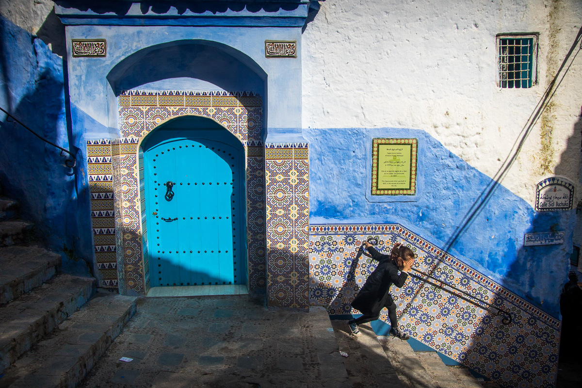 Chefchaouen stairs girl