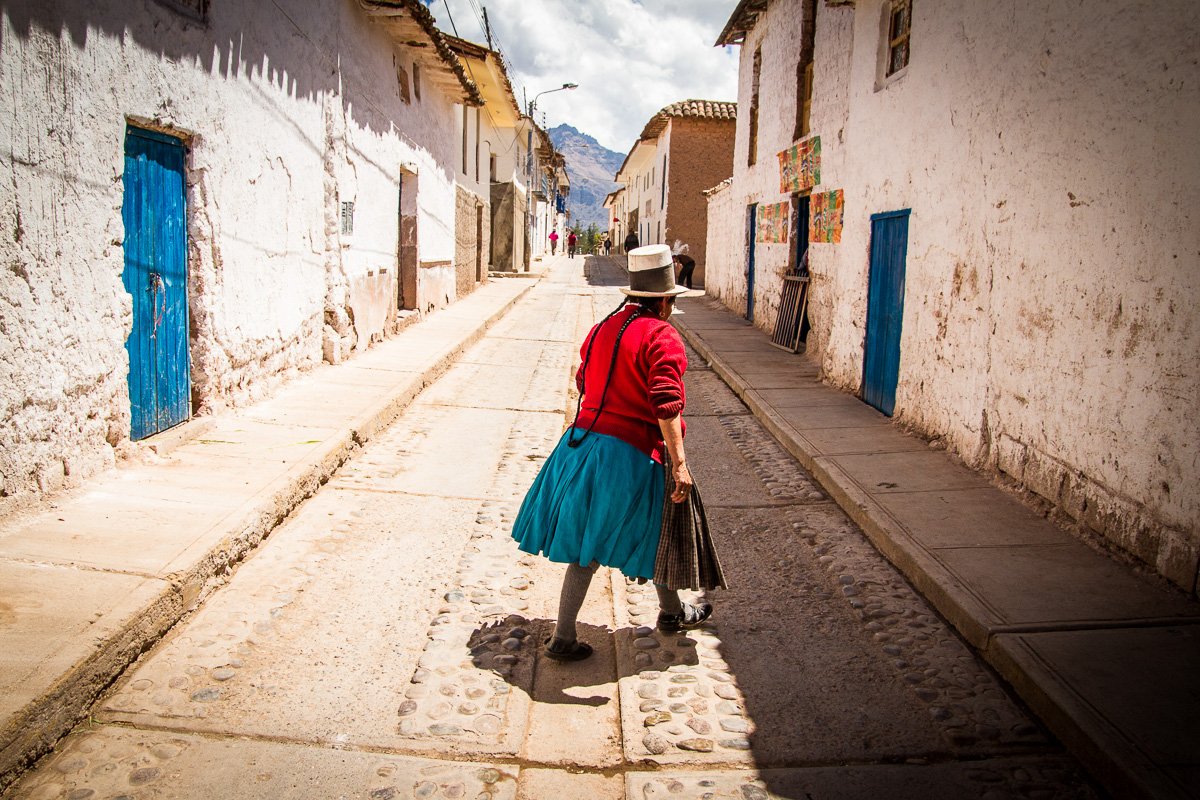 Crossing Peruvian woman blue